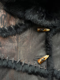 Metallic paneled shearling-trimmed leather jacket