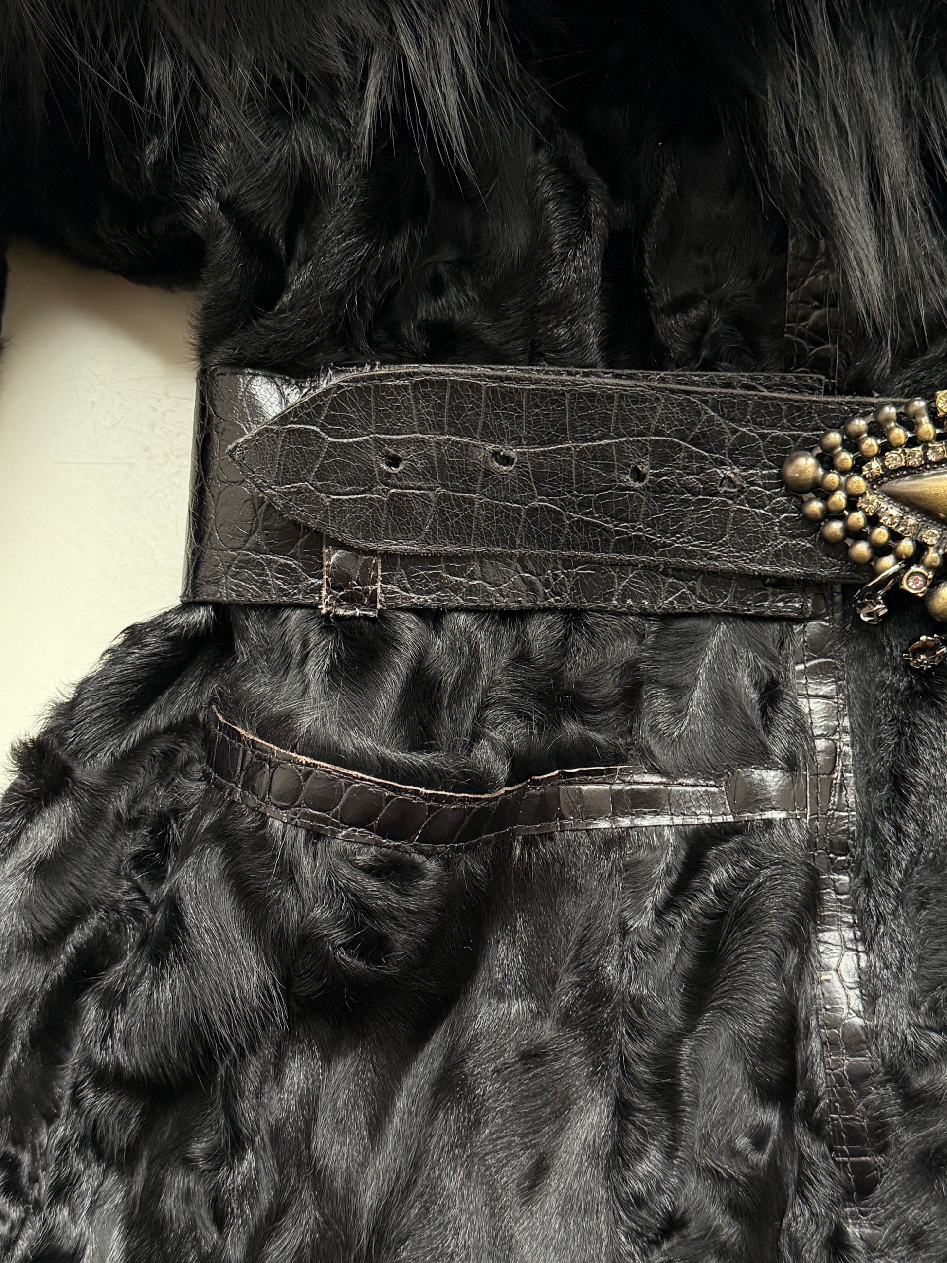 Belted shearling and leather jacket