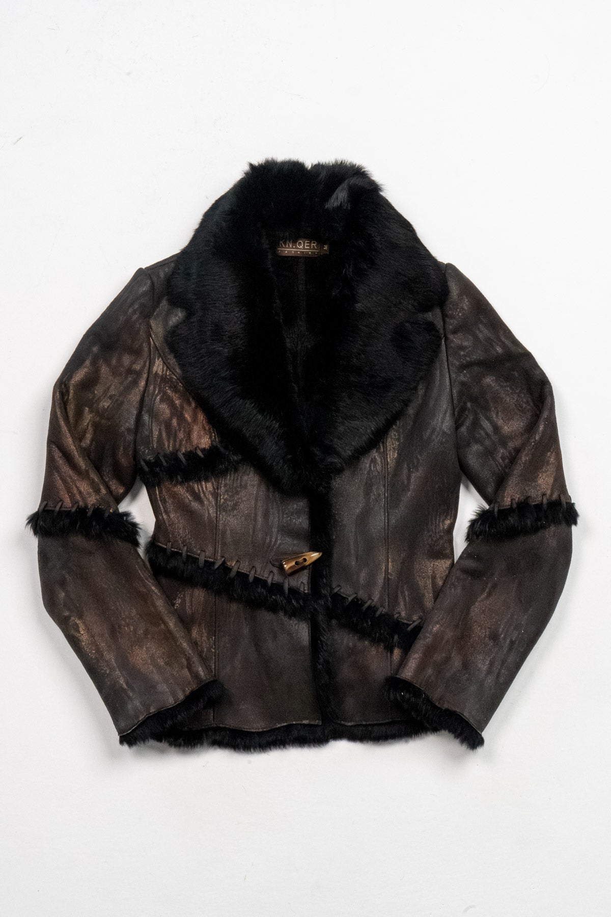Metallic paneled shearling-trimmed leather jacket