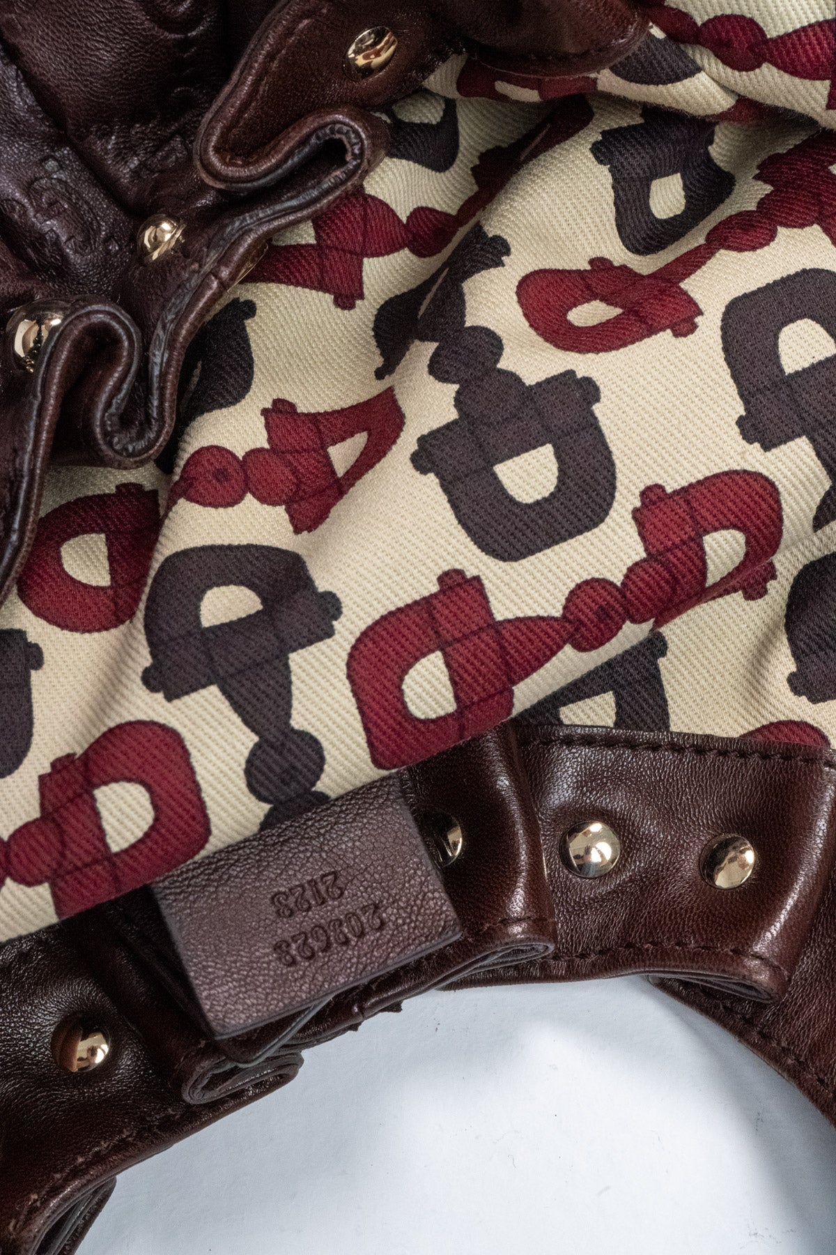 GG Pelham embossed leather hobo bag