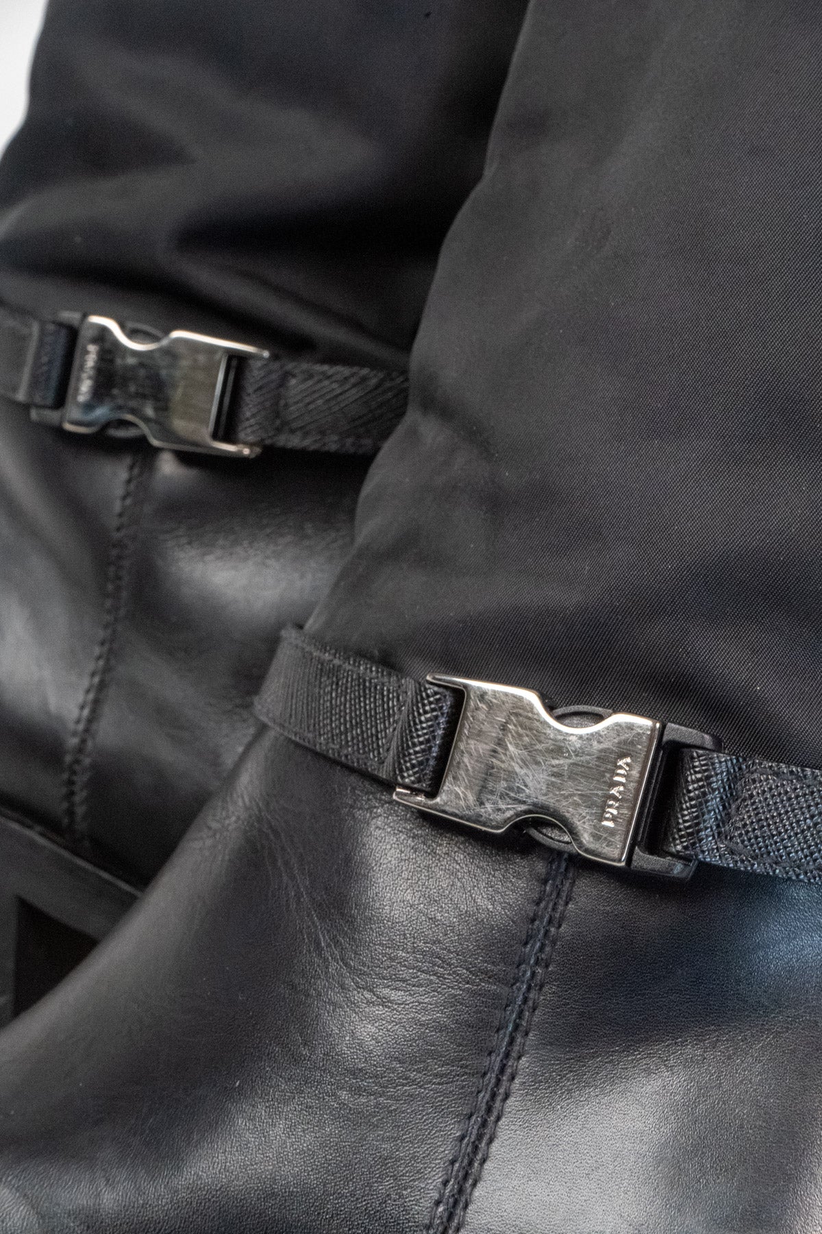 Prada Re-Nylon leather knee-high boots (Size 38)