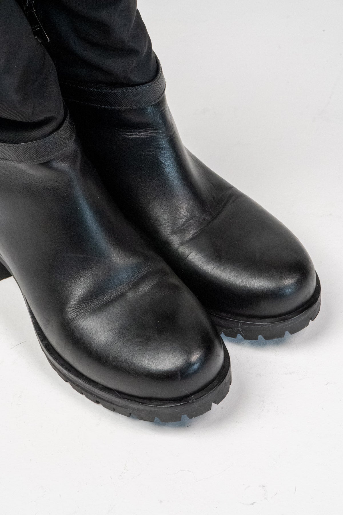 Prada Re-Nylon leather knee-high boots (Size 38)